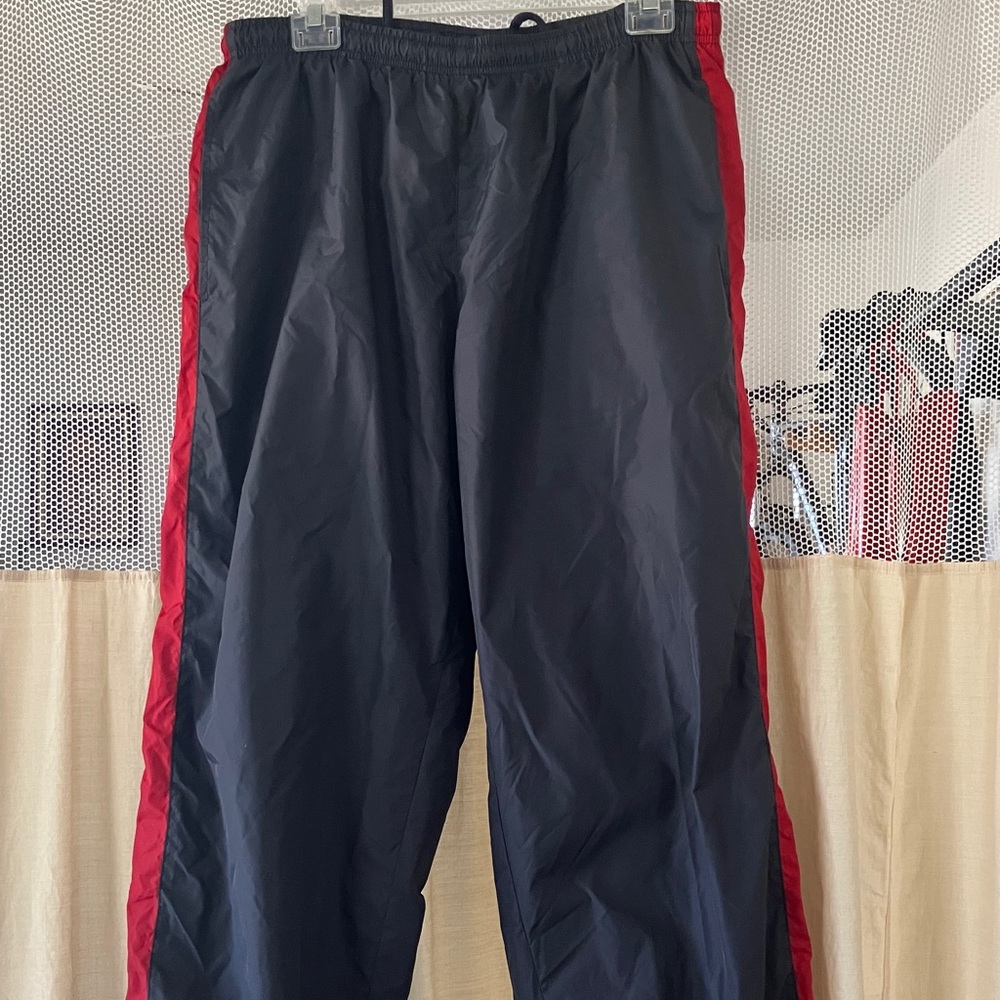 Nike Men's Black Track Pants with Red Side Stripe